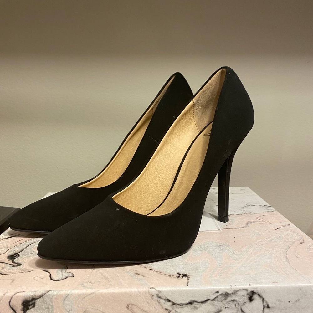Black suede pumps